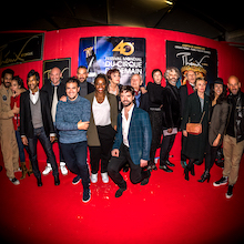 The celebrities crowd around the laureates of the 40th Festival